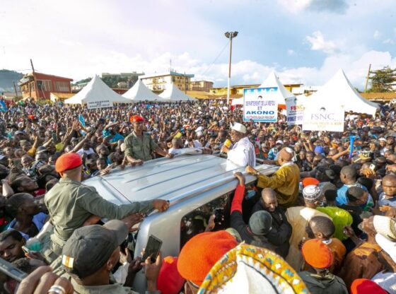 (FILES) Supporters gather around Cameroonian presidential candidate Issa Tchiroma Bakary during a campaign rally in Yaounde on October 3, 2025.