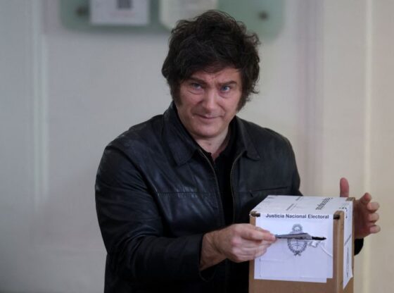 Argentina's President Javier Milei votes during the midterm election, which is seen as crucial for his administration after U.S. President Donald Trump warned that future support for Argentina would depend on Milei's party performing well in the vote, in Buenos Aires, Argentina, October 26, 2025. REUTERS/Cristina Sille REFILE - QUALITY REPEAT