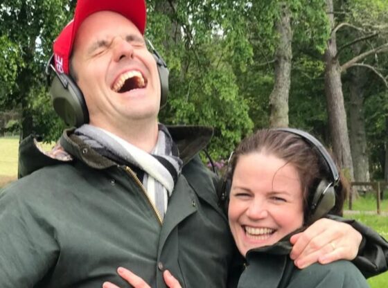 Ben Lewis and his wife Melle Stewart share a joyful moment outdoors. (Image via Todd Woodbridge/Instagram)