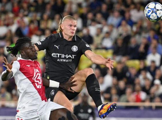 Erling Haaland lobs the Monaco goalkeeper to put Man City ahead in their Champions League tie