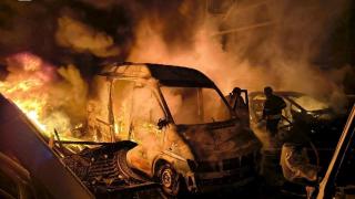 Firefighters work at the facilities of a company affected by attacks with drones and Russian missiles.