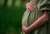 To keep the lie going for so long, Kira Cousins wore a prosthetic belly that simulated a growing pregnancy.