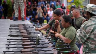 Venezuela carries out drills to train citizens in handling weapons.