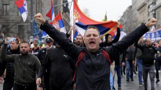 Image of protesters on the streets of Belgrade.